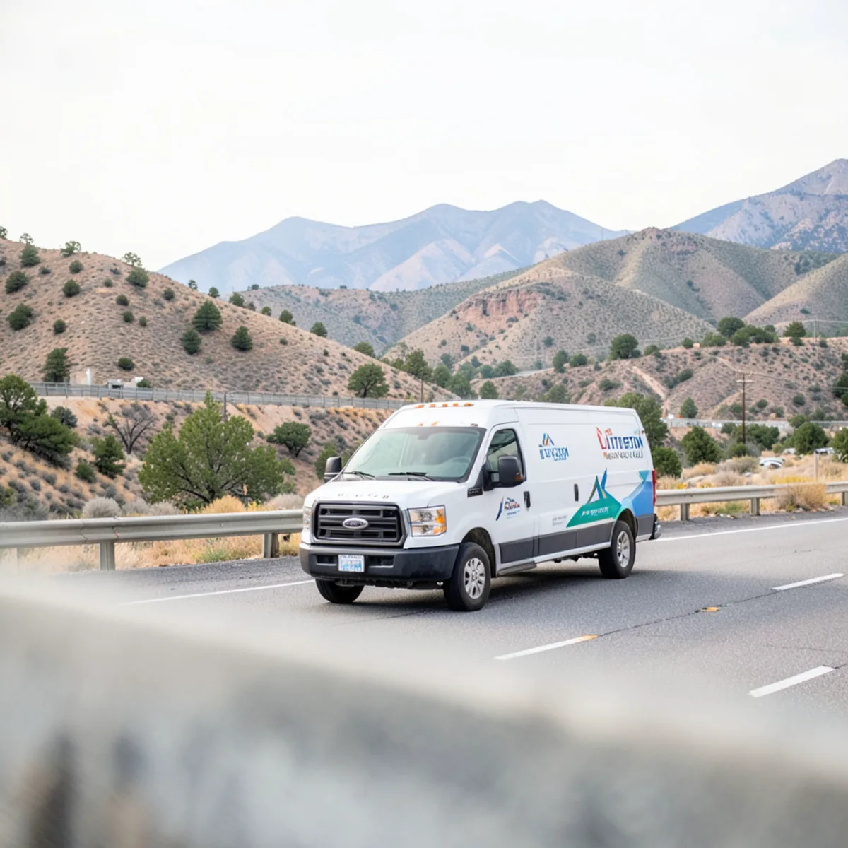 Sewer service van driving along the C-470 highway corridor near the Littleton an